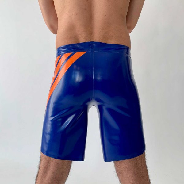 Latex Skater Hose in blau ,weit geschnitten am Bein, mit orangen Streifen und weißem Logo