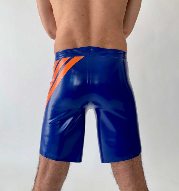 Latex Skater Hose in blau ,weit geschnitten am Bein, mit orangen Streifen und weißem Logo